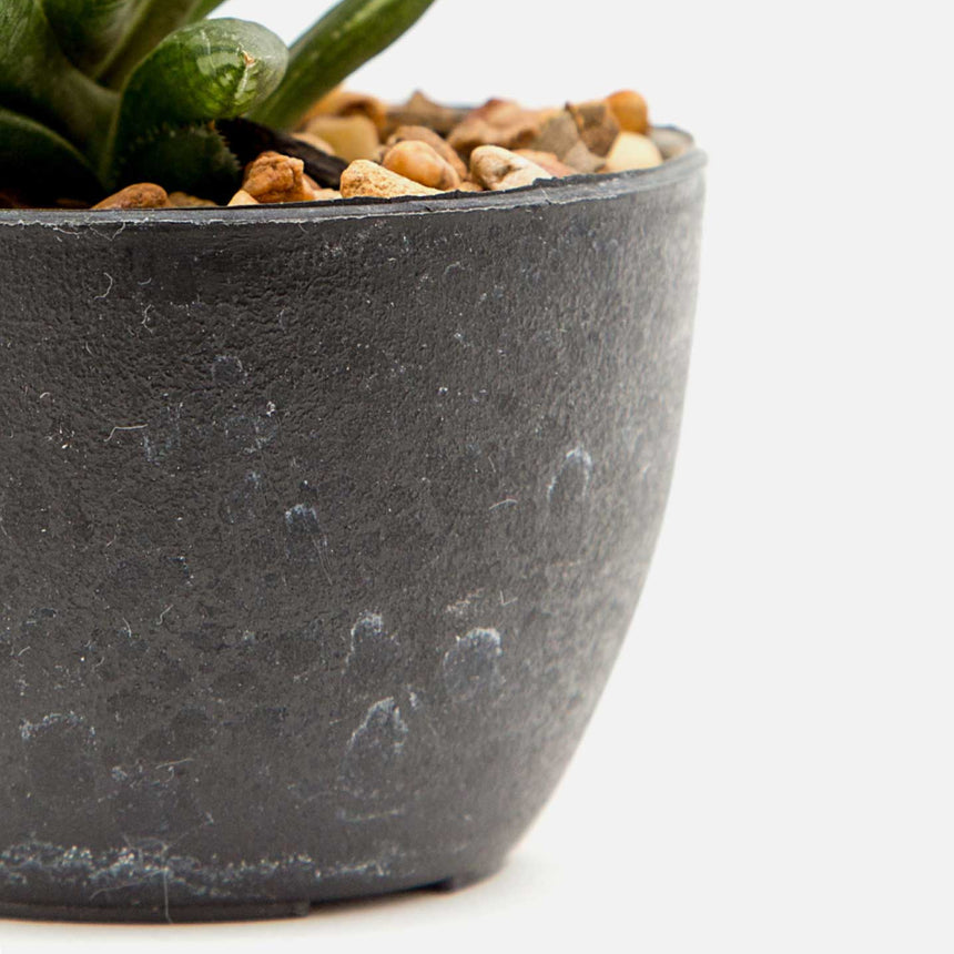 Pot with artificial plant